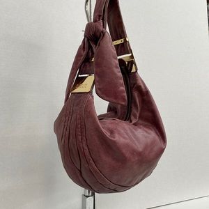 Badgley Mischka genuine distressed leather hobo bag.